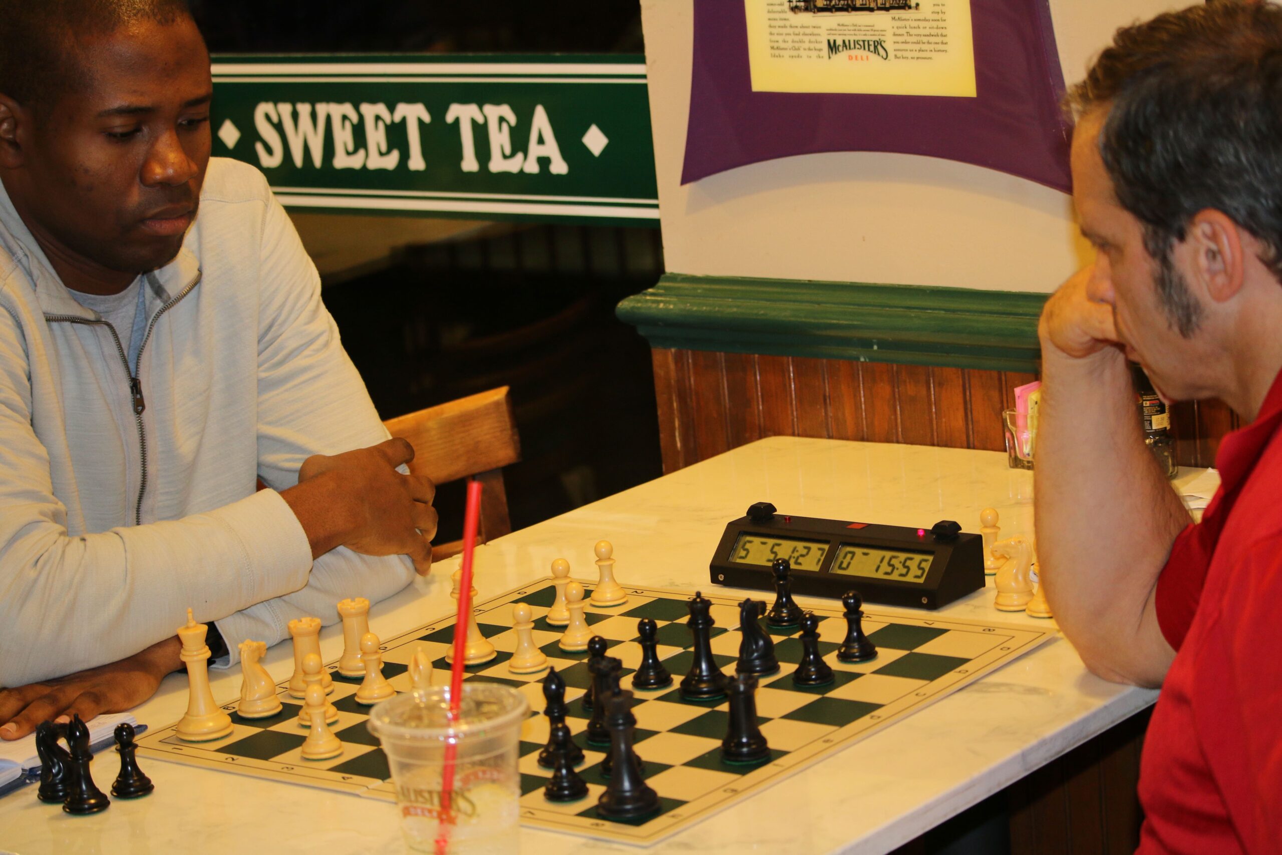 Bernard teaching over the board during a lesson.